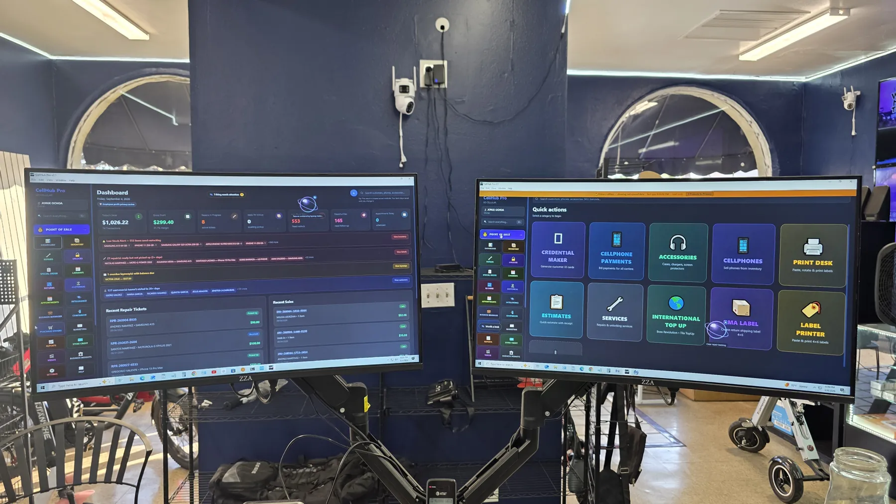 CellHub Pro repair management system on dual monitors