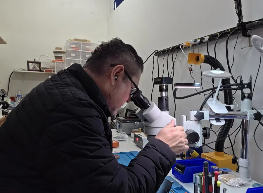 Technician working at the repair bench
